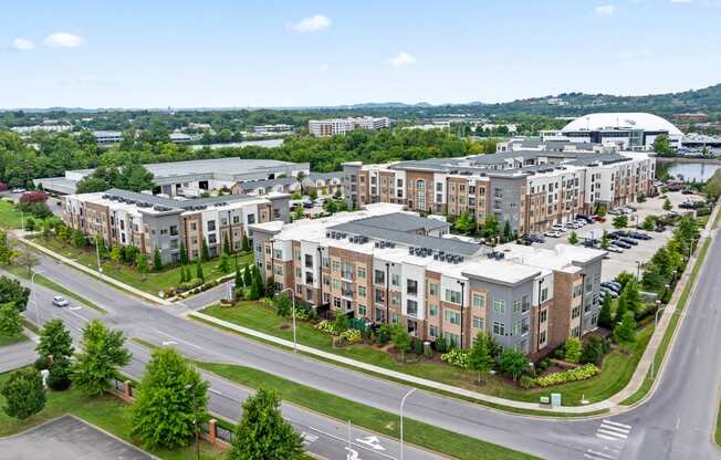 an aerial view of an apartment complex on a city street
