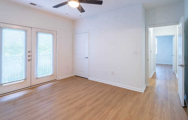 Bedroom with Balcony and Hard Surface Flooring