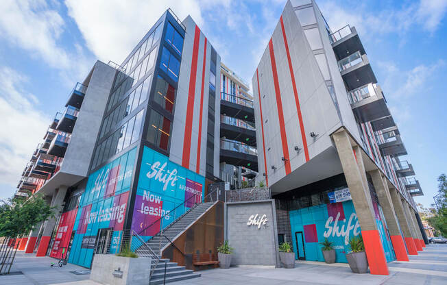 a large building with a staircase in front of it