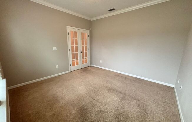 Modern 4 Bed 2 Bath Home. Double Garage. Screened in Lanai. Bonus Room. Minutes from World Golf Village!