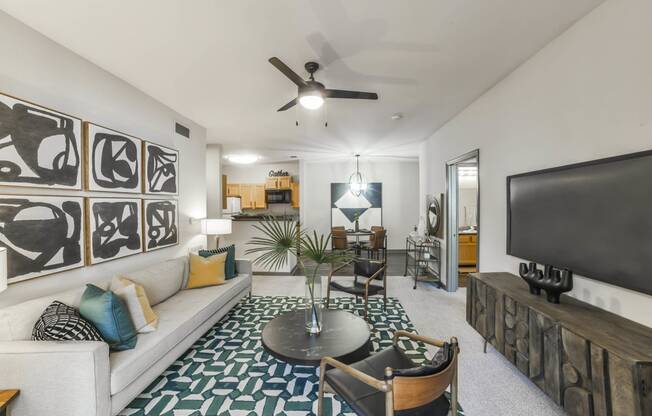 a living room with a couch and a tv