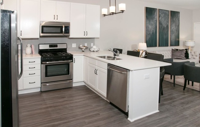 Kitchen with Over-the-Range Microwaves at Residences at 1700, Minnesota