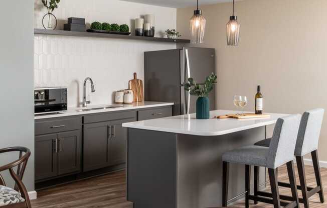 an open kitchen and dining area with a table and chairs