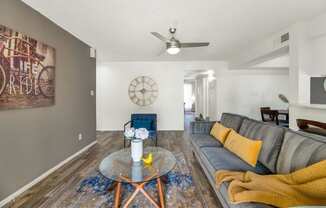 a living room with a couch and a table