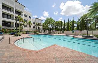 Pool deck with cabanas and lounge seating