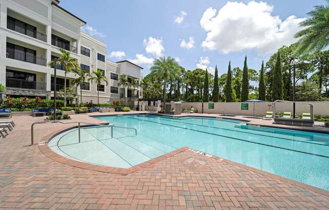 Pool deck with cabanas and lounge seating