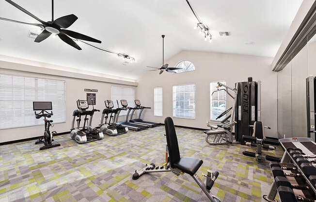 Community Fitness Center with Equipment at Vue at Baymeadows Apartments in Jacksonville, FL.