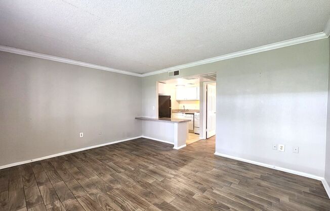 Ground Floor End-Unit; New Paint; All-Tile Flooring; Pool; Water/Sewer INCLUDED in the Rent!