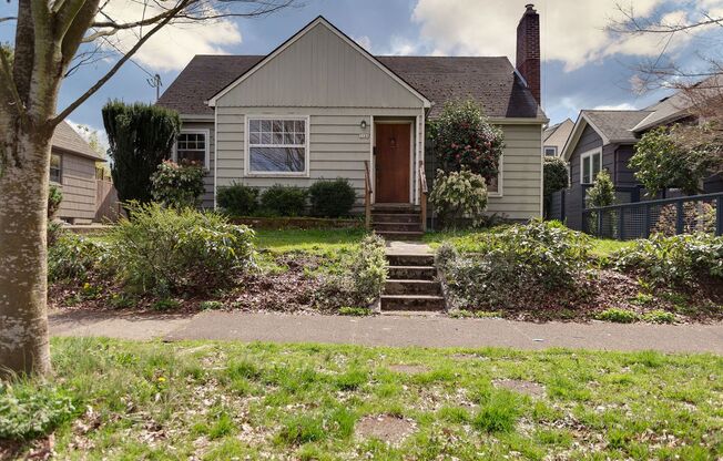 Charming 1901 Bungalow with Modern Updates and Stunning West Hills Views