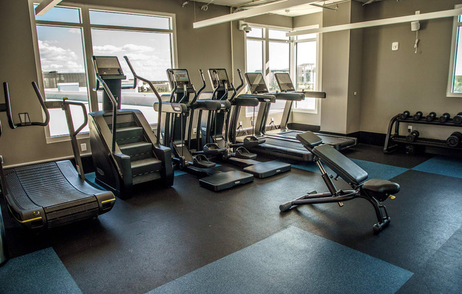 cardio equipment in front of windows in fitness center at Lake Nona Pixon, Florida, 32827