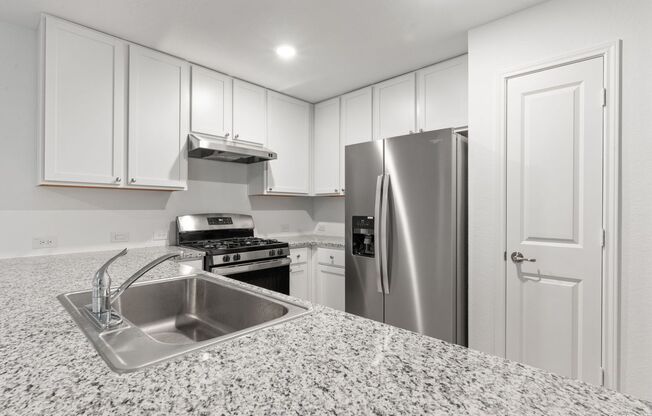 This beautiful single-story home has 4 bedrooms, 2 baths, vinyl flooring throughout, an open floor plan
