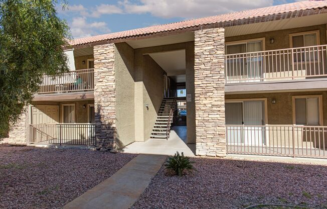 2nd floor unit in upscale guard gated SW complex near Strip
