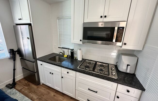 5211-5209 Tipton St.