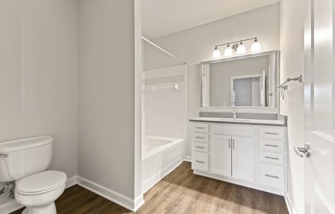 Bathroom with large vanity and soaking tub