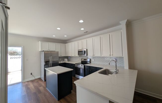 Pristine End Unit Townhome located in the Prosperity Place community!