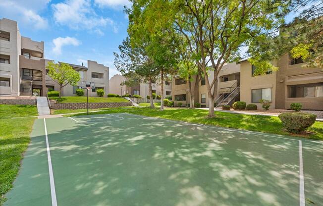 Shady Outdoor Basketball Court at Best Apartments ABQ La Mirage