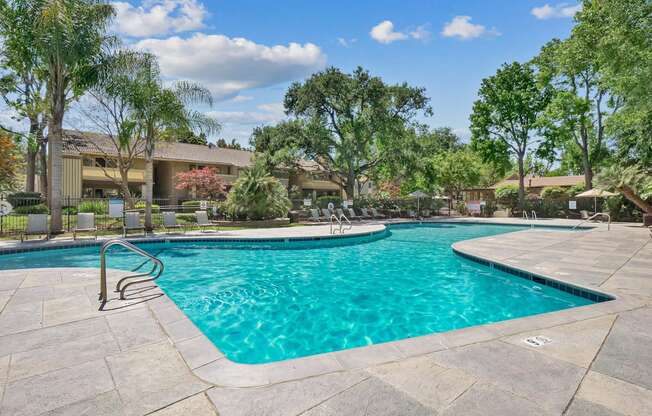 a swimming pool at Summerwood Apartments, Santa Clara, CA