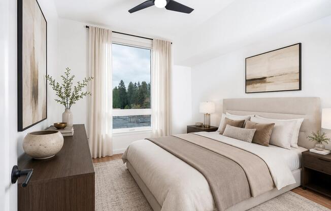 Primary bedroom with soft natural light, tailored finishes, and a calm layout designed for rest and a comfortable daily rhythm.