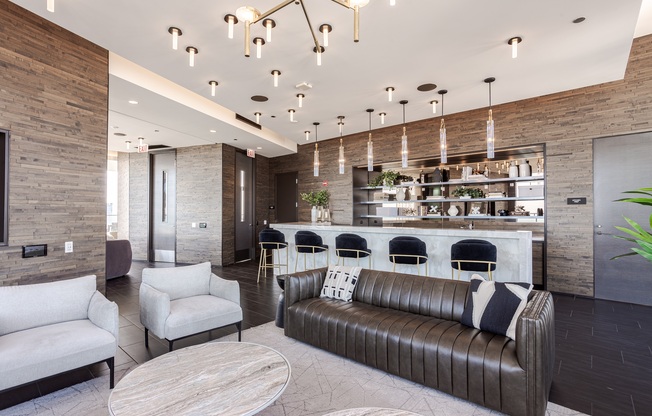 A modern living room with a long couch and a coffee table.