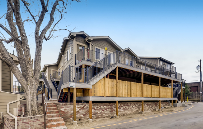 Explore contemporary living in this beautifully structured two-story apartment with inviting outdoor spaces.