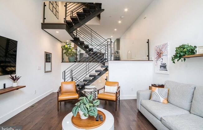 HUGE BRIGHT HOME 3 bed 2 full 2 half PRIVATE GATED PARKING WITH GARAGE 2 PARKING SPOTS ROOFDECK AND MORE