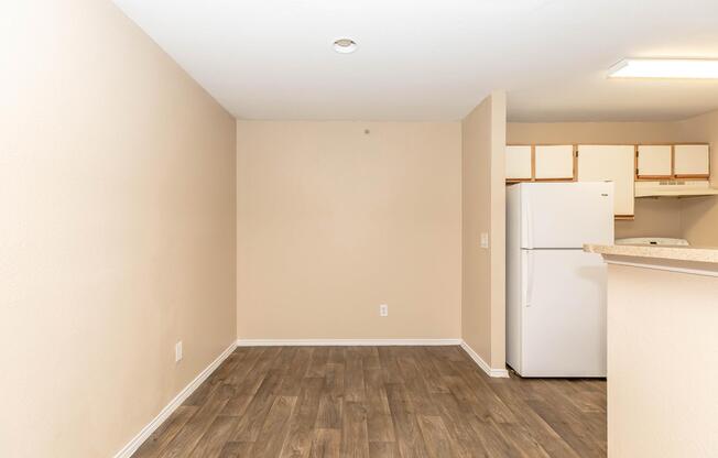 a kitchen with a wood floor