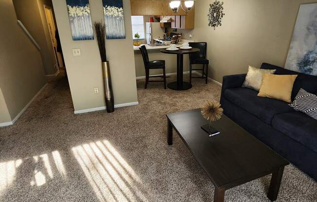 a living room with a couch and a coffee table