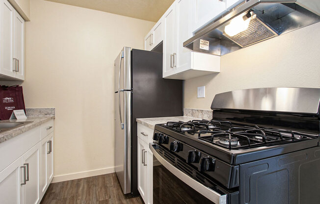 a kitchen with stainless steel appliances at Old Farm Apartments, Elkhart, Indiana