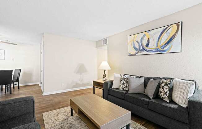 a living room with a couch and a coffee table