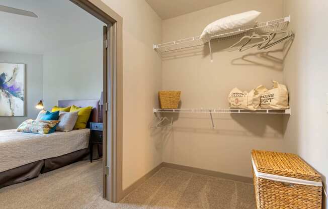 large closet with basket and shelving,at 1010 Dilworth Apartments, North Carolina