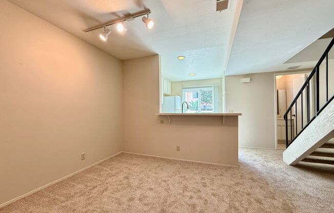 Spacious & Move In Ready 2BD Townhome! New Carpet! Full Size in Unit Washer/Dryer! Attached Garage!