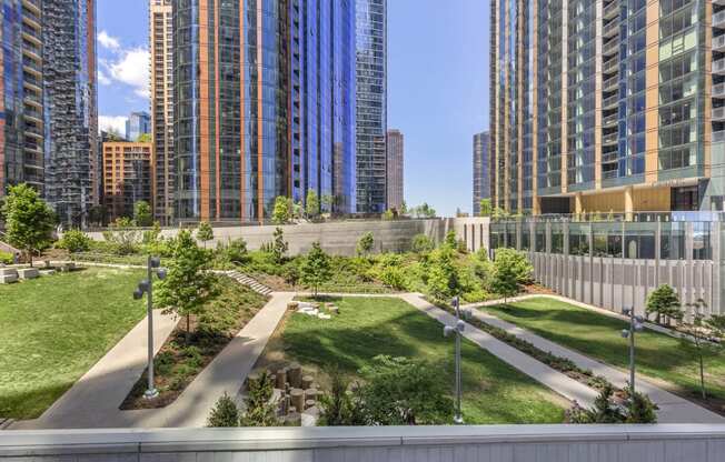 a view of a park with skyscrapers in the background at North Harbor Tower, Chicago