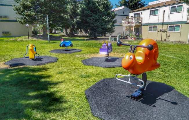 La Verde Apartments Outdoor Playground with Spring Riders