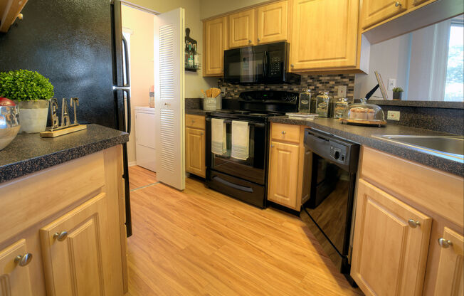 Spacious kitchens include a pantry and plenty of above and below cabinet storage.