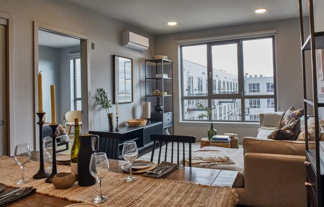 Living room with a large window at Sono Central Residential, Norwalk, CT