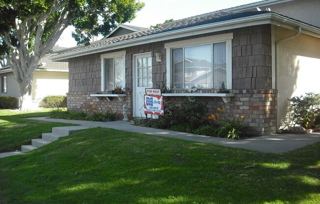 Very Nicely Upgraded Single Story Condo with New carpeting and wood plank flooring.