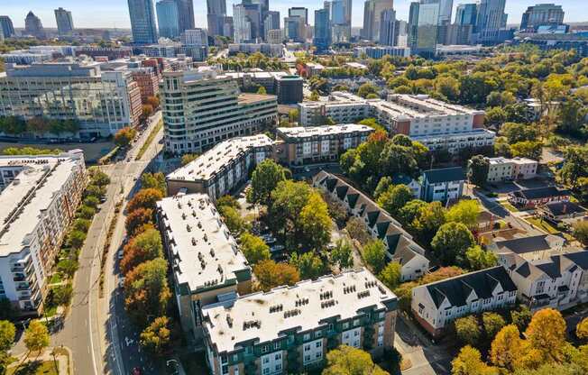 Flatiron West Trade Apartments aerial view with Charlotte skyline in background