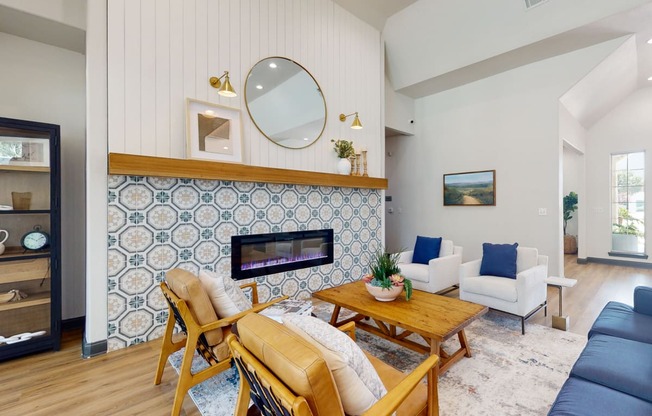 a living room with a fireplace and blue and white tiles