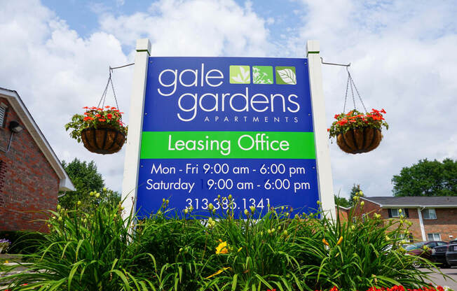 Gale Gardens Leasing Office sign with flower landscaping