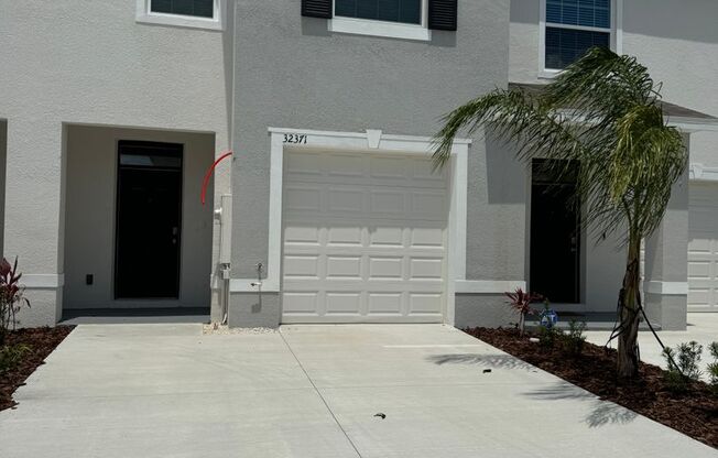 BRAND NEW TOWN HOUSE AT THE GATED COMMNITY OF MEADOW RIDGE