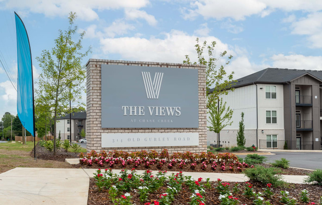 the views at city center sign in front of apartments