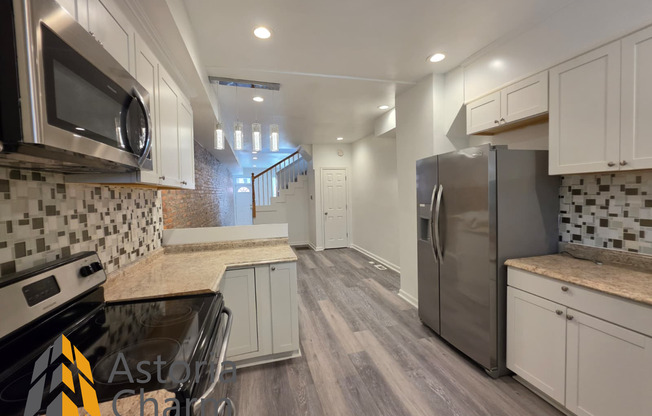 3 Bedroom End Unit with Finished Basement and Fenced Yard on E 28th Street