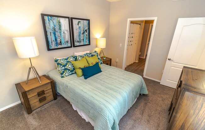 a bedroom at the enclave at woodbridge apartments in sugar land, tx