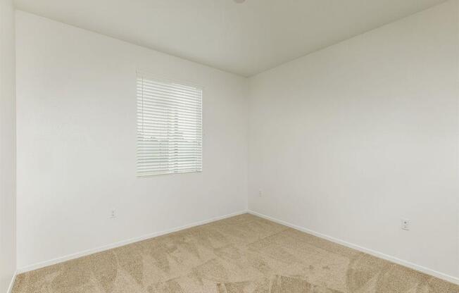 2nd bedroom with a lot of space with window