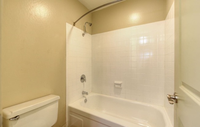 Bathroom with Shower with Bathtub and Toilet