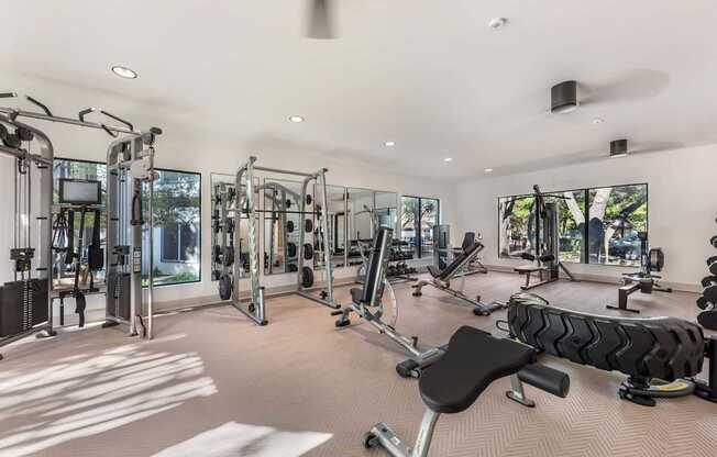 A gym with a variety of equipment at Sedona Springs, Austin, TX 78749