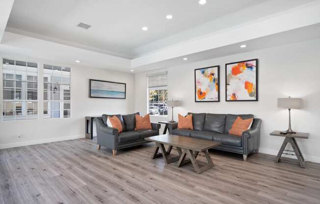 a living room with couches and a table