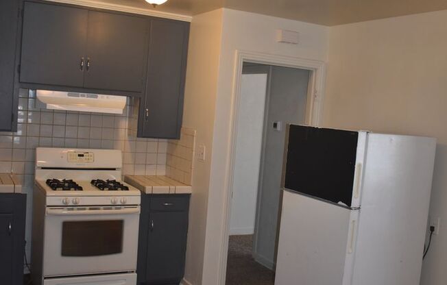 Charming Three Bedroom Home with New Carpet/ Built-ins/ Miracle Mile