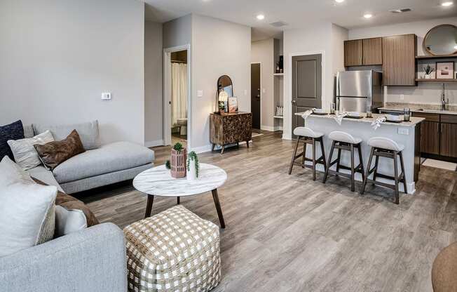 an open floor plan with a kitchen and a living room