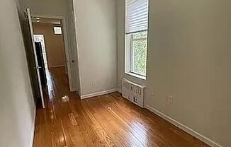 235 E 27 ST